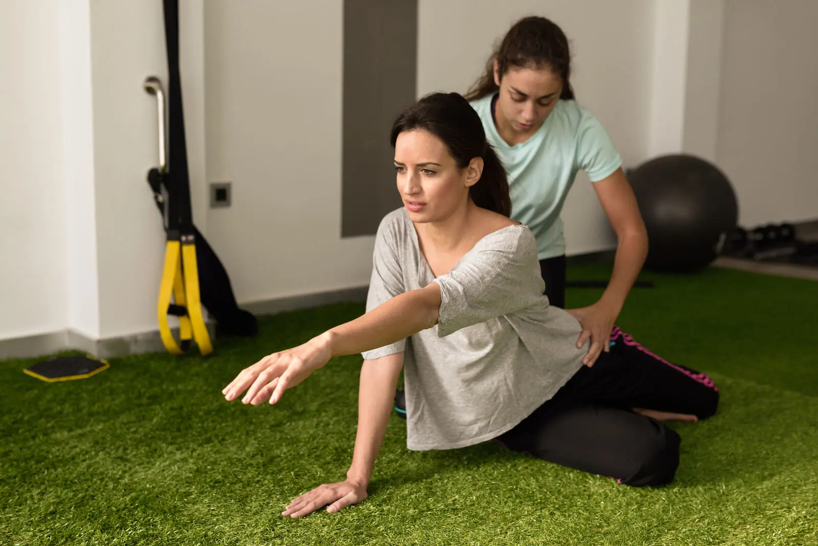 Person doing a gentle physiotherapy stretch
